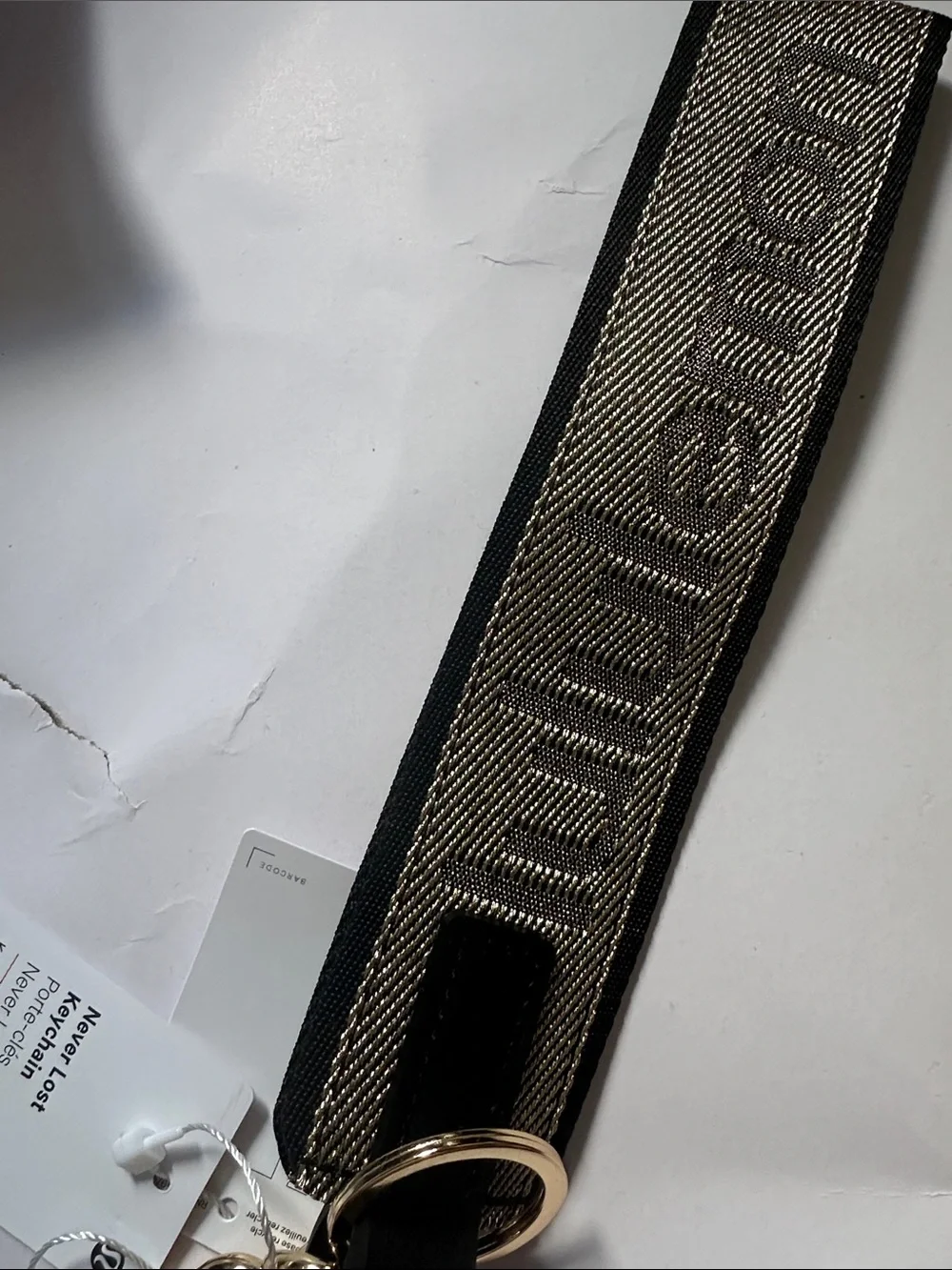 lululemon athletica Black and Beige Logo Woven Key Strap with Gold Hardware